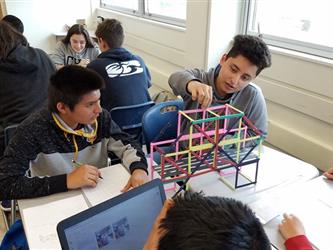 Students working in class on a project