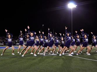 cheer performing on football field