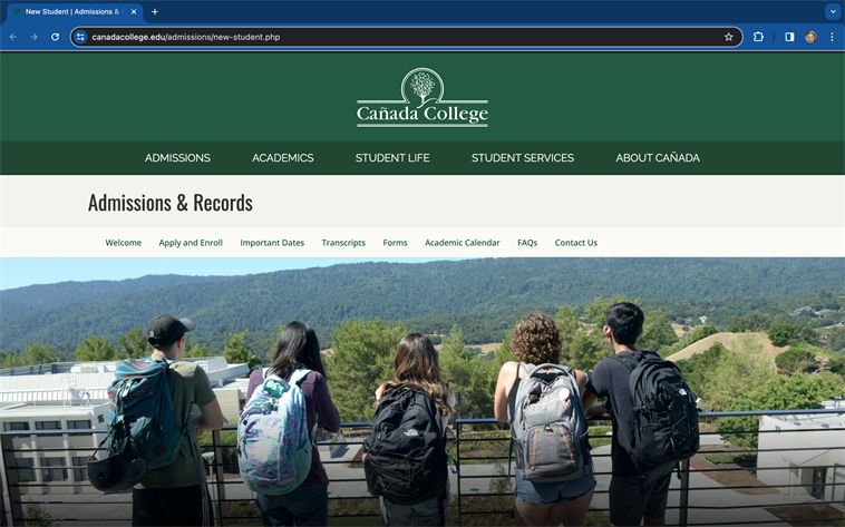 college students with backpacks looking over a mountain ridge